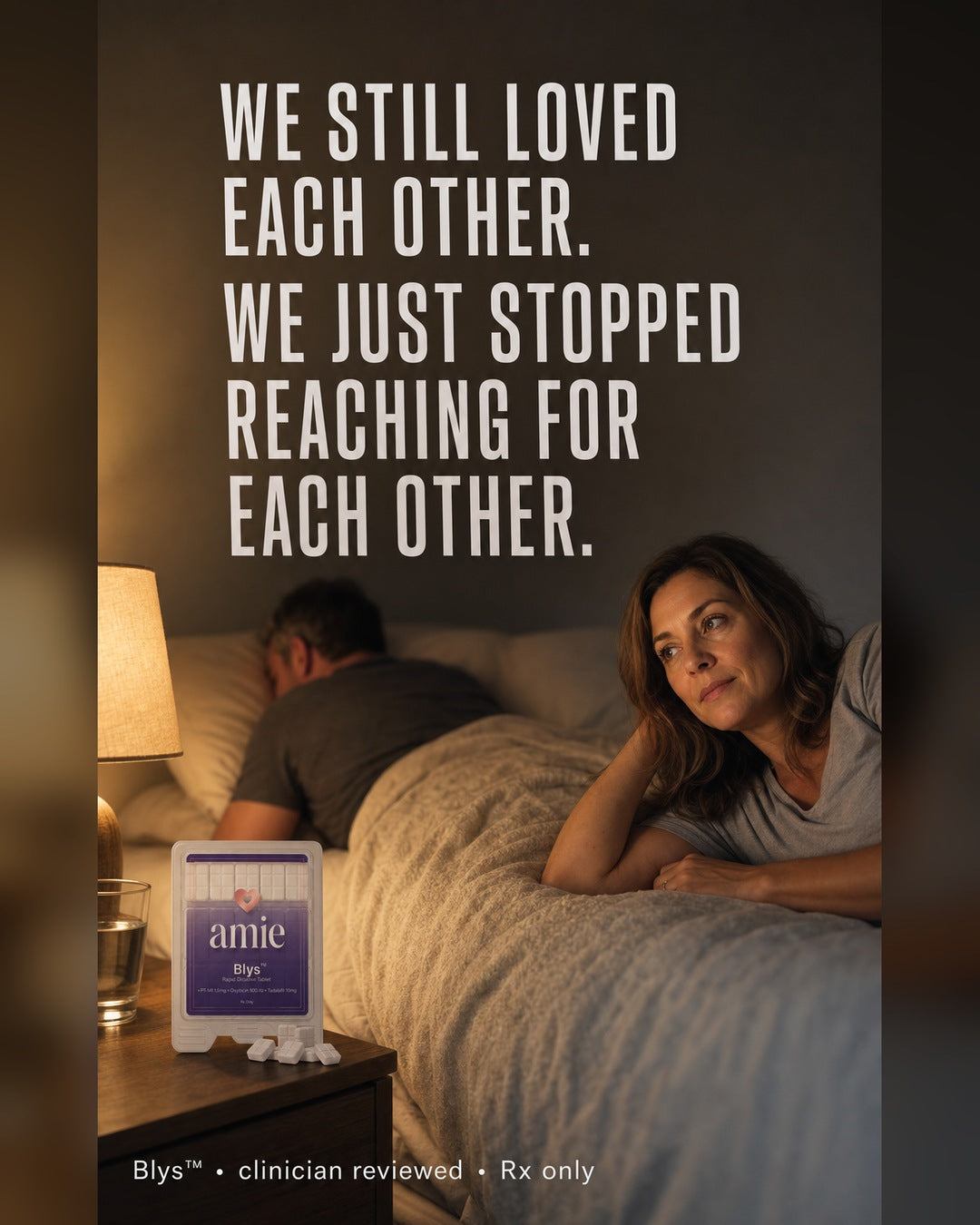 Woman awake beside her sleeping partner with Blys by Amie