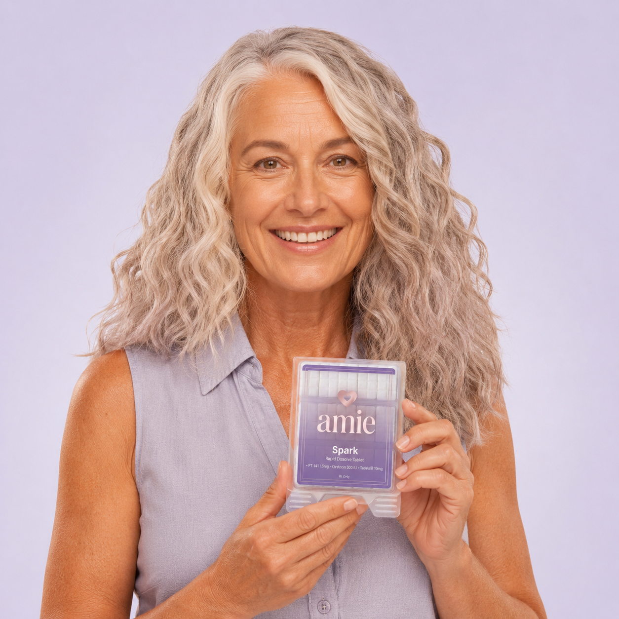 Woman holding a Spark package